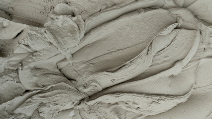 ฺBackground and textured of. Fine liquid cement for plastering the surface of the walls of the house.