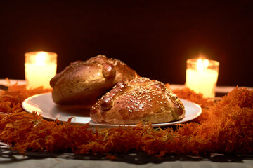 Bread of the dead cempasúchil flowers were used around it and candles were placed to set the scene, confetti was also placed