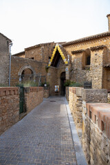 Fototapeta na wymiar Church of Saint Mary Magdalene in Rennes-le-Château, Aude, Occitanie, South France. Detail of entrance