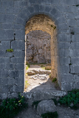 Fototapeta na wymiar Walls of the Montsegur Castle, Ariege, Occitanie, France. Detail of a entrance