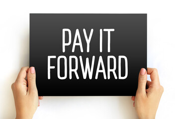 PAY IT FORWARD text quote on card, concept background