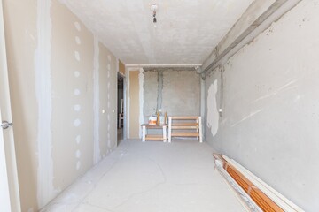 Fototapeta premium interior of the apartment without decoration in gray colors