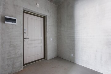 interior of the apartment without decoration in gray colors