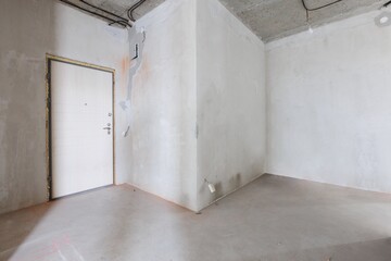 interior of the apartment without decoration in gray colors