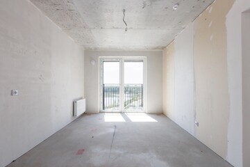 interior of the apartment without decoration in gray colors