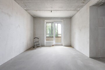 interior of the apartment without decoration in gray colors