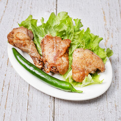 grilled chicken wings with vegetables