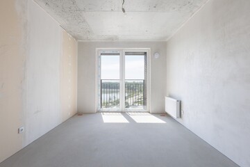 interior of the apartment without decoration in gray colors