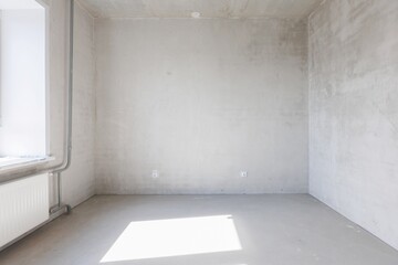 interior of the apartment without decoration in gray colors