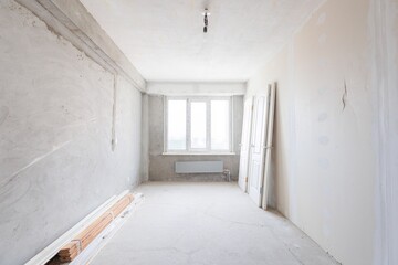 interior of the apartment without decoration in gray colors