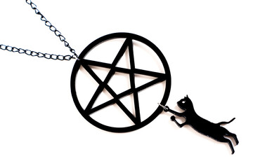 Pentagram and black cat necklace on white