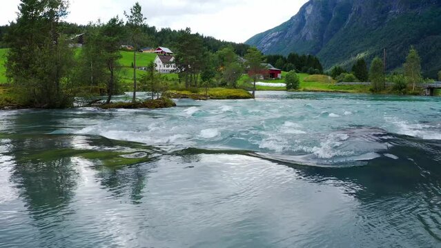 Stryn village and blue lake, beautiful nature of Norway lakes and mountains, Aerial