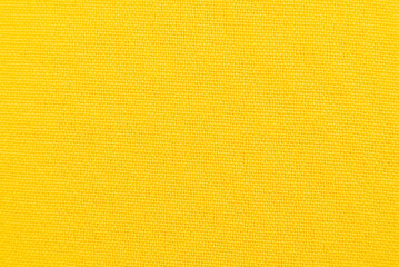 Texture of luxurious yellow fabric. Silk. chintz