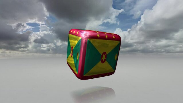 [Loop video] A loop animation in which a cube printed with a metallic grenada flag rotates.