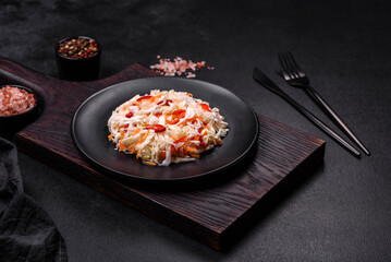 A delicious fresh vegetarian salad of white cabbage, carrot and paprika
