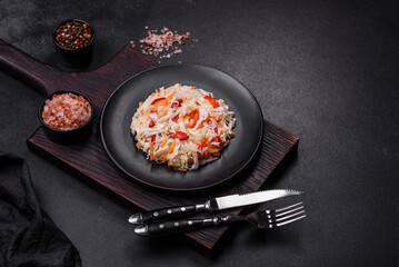 A delicious fresh vegetarian salad of white cabbage, carrot and paprika