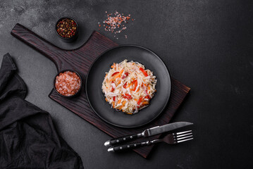 A delicious fresh vegetarian salad of white cabbage, carrot and paprika
