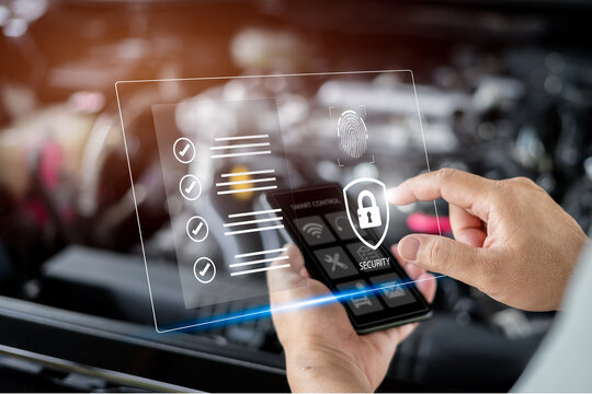 Protection and security of vehicle data on virtual screens concept, Man finger scan to encrypt the technology of the application on a smartphone to connect the system. and check documents online