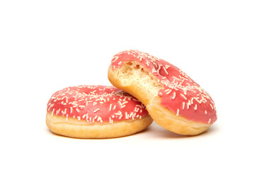 Whole and bitten donuts with frosted pink color glaze and white sprinkles isolated on white background