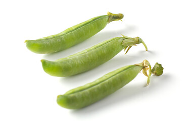 Pea pods on a white background, green peas in a pod