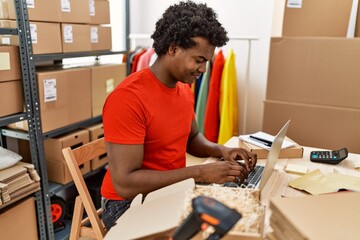 Young south east man smiling confident working at storehouse