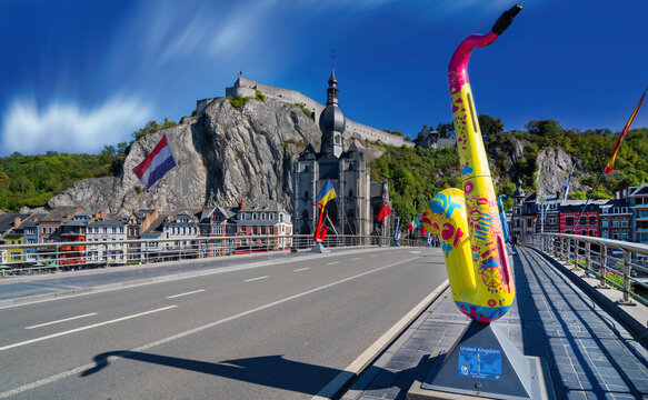 The bridge over the Meuse River, Pont du Charles de Gaulle, in Dinant, Belgium, is decorated with colorful saxophones in memory of Adolphe Sax, the inventor of the saxophone