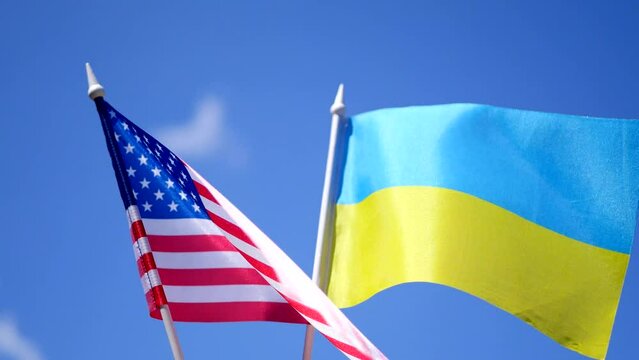 Ukrainian and American flags. Trade cooperation. Travel visas. International diplomacy 