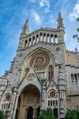 Fototapeta premium Vertical view of the Parish of Sant Bartomeu de Sóller (Spain) on a sunny summer afternoon