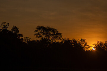 Obraz na płótnie Canvas Brazilian Sunset Very beautiful, the sunsets in brazilian savannah has many colors.