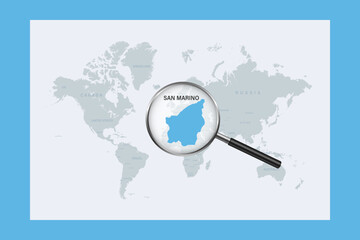 Map of San Marino on political world map with magnifying glass