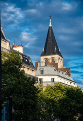 Fototapeta na wymiar The steeple for the Cathedral Saint-Germain on the Blvd. Saint-Germain.