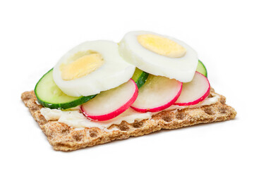 Whole Grain Crispbread with Fresh Cucumber, Egg, Cream Cheese and Radish - Isolated on White. Quick and Healthy Sandwiches. Crispbread with Tasty Filling. Healthy Dietary Snack - Isolation