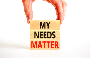 My needs matter symbol. Concept words My needs matter on wooden blocks. Businessman hand. Beautiful white table white background. Business, psychological and my needs matter concept. Copy space.