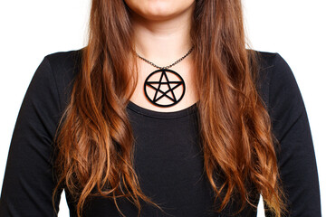 Brown hair woman wearing a pentagram necklace