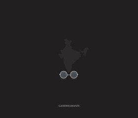 Happy Gandhi Jayanti. Gandhi's eyeglasses with the Indian flag. isolated on black background. vector illustrations.