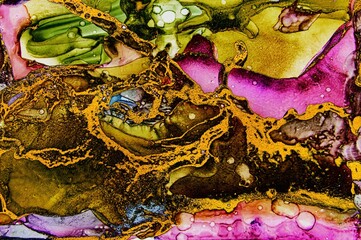 Torn edges with golden foil on Alcohol ink fluid abstract texture fluid art with gold glitter and liquid.