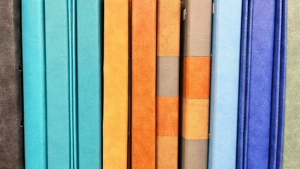 Colored school supplies Colored paper Agendas, colored books. folders Paper texture. color books