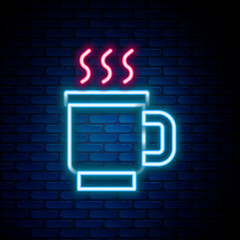 Glowing neon line Cup of tea icon isolated on brick wall background. Colorful outline concept. Vector