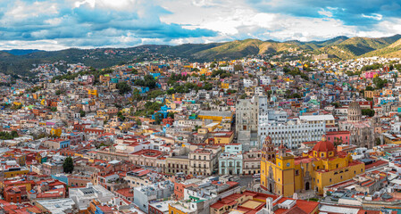 Fototapeta na wymiar Aerial: panorama view of the landscape and cityscape in Guanajuato, Mexico. Drone view 