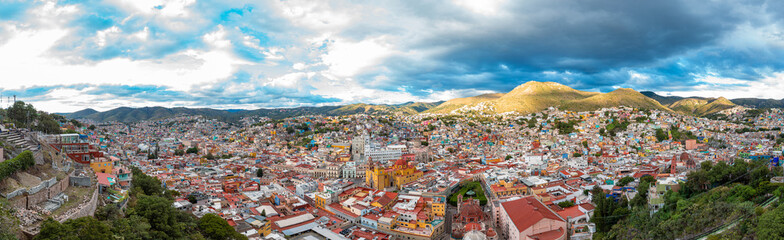 Aerial: panorama view of the landscape and cityscape in Guanajuato. Drone view

