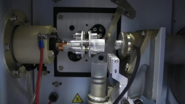 Details from an ICP-OES equipement where a radio frequency is used to heat a argon plasma and create atomic emission for chemical analysis purposes