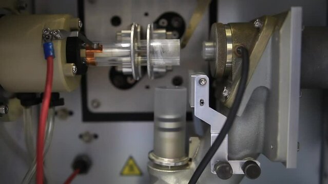 Details from an ICP-OES equipment where a radio frequency is used to heat a argon plasma and create atomic emission for chemical analysis purposes