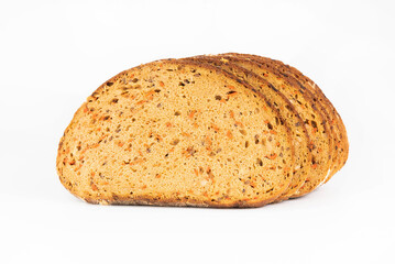 Sliced ​​wholesome bread with seeds against white background.