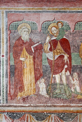 Obraz na płótnie Canvas Sant'Antonio Abate e San Cristoforo. Affresco nella chiesetta dei Santi Ippolito e Cassiano a Castel Tesino (Trentino)