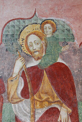 San Cristoforo.  Affresco nella chiesetta dei Santi Ippolito e Cassiano a Castel Tesino (Trentino)