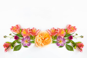 Festive floral background. floral layout from peach and orange flowers isolated.