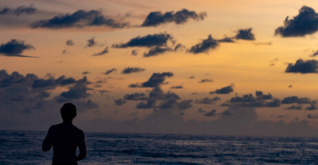 Fototapeta premium silhouette of a person in the sunset