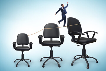 Promotion concept with businessman and chairs