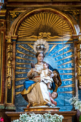 Fototapeta na wymiar Inside the catholic church of San Nicolas de Bari in Burgos, Spain, located next to the Camino de Santiago
