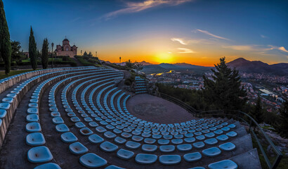 Seats for sunset, Trebinje from a hill top view from a temple mountains and cityscape with colorful sky